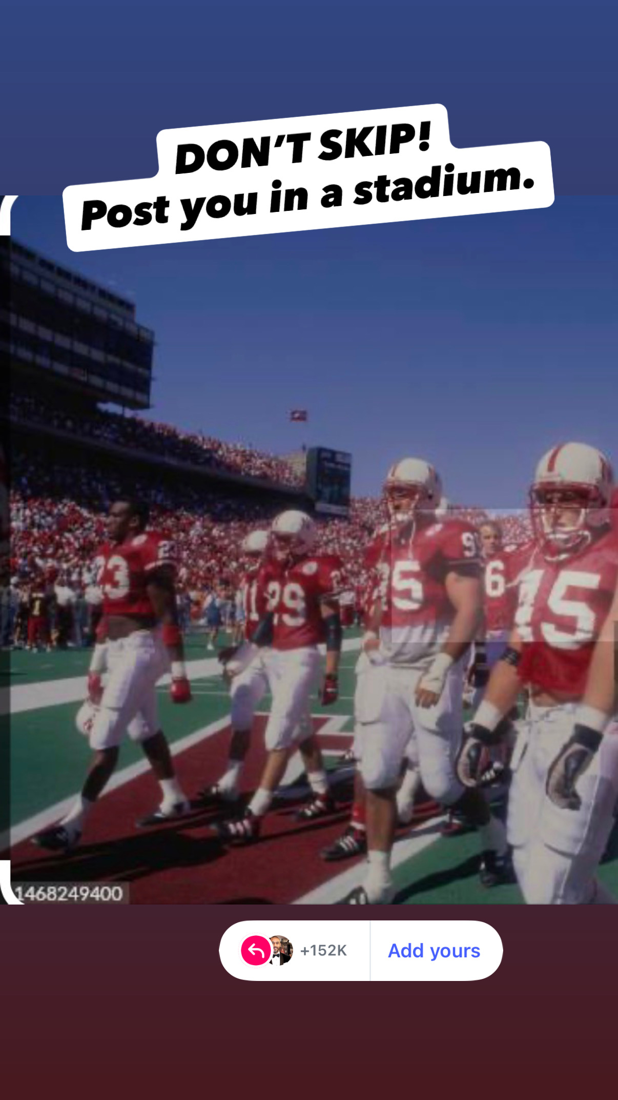 Nebraska football players on the sideline